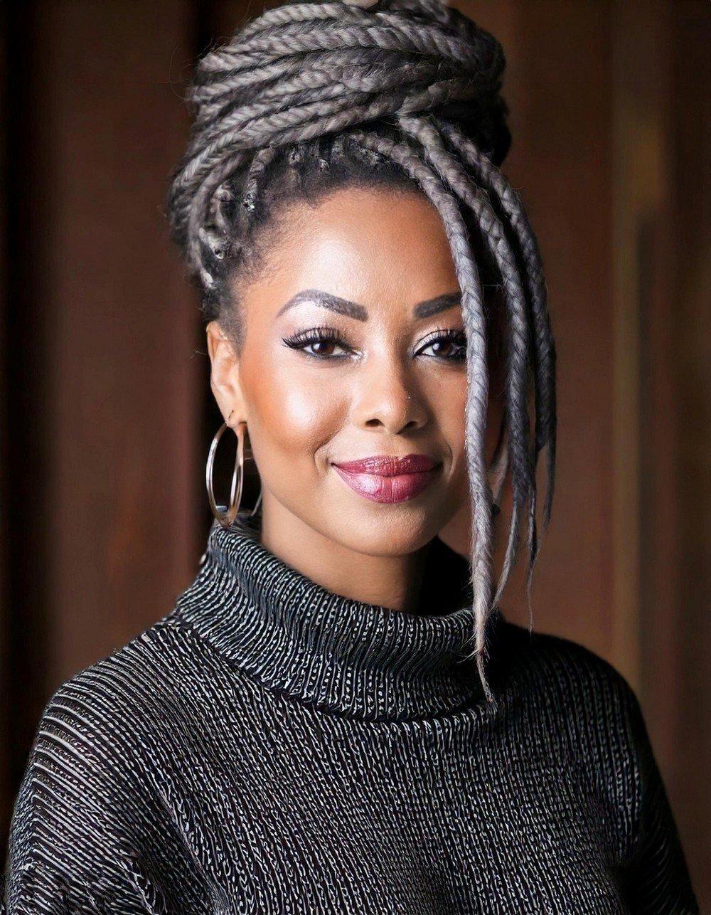 Locs in Charcoal with Side Part